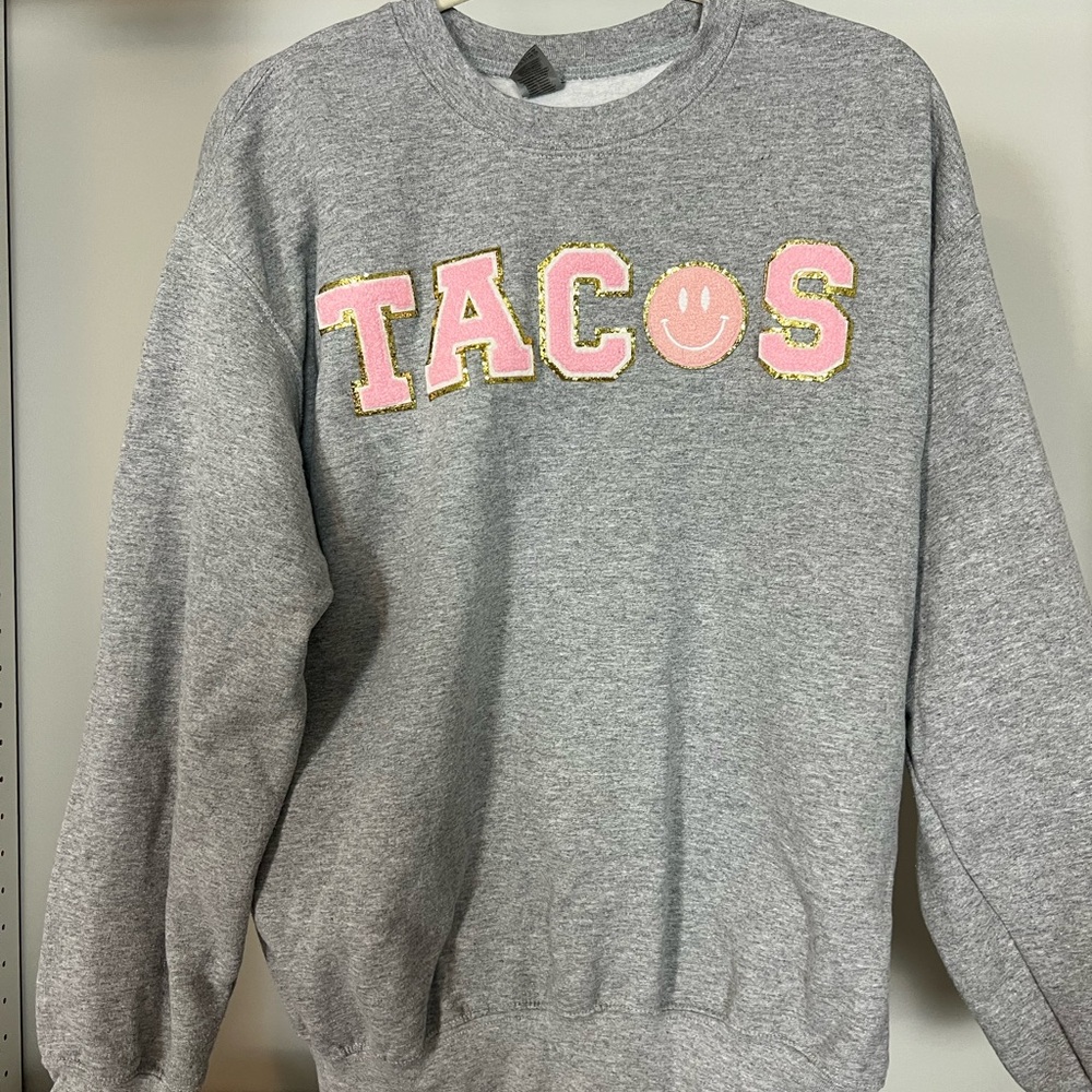 Gray Sweatshirt with Pink 'TACOS' Design